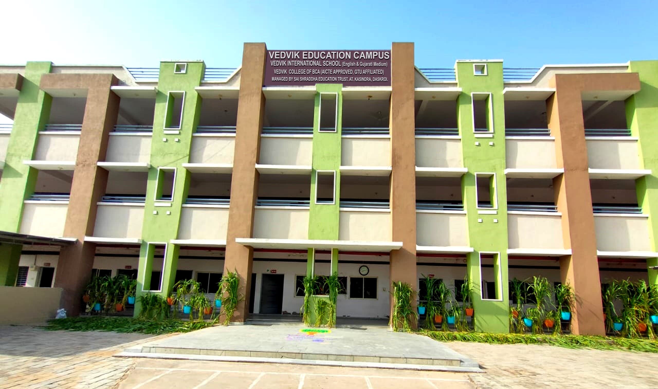 Vedvik Education Campus entrance with signboard
